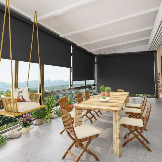 Outdoor blinds enclosing a covered dining patio